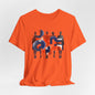 Orange t-shirt with abstract design on a light gray background