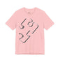 Pink t-shirt with a big outline design of a puzzle piece.