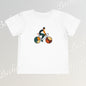 White t-shirt with a colorful graphic of a bike on a gray background