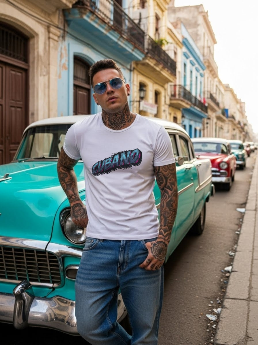 Man wearing a 'Cubano' t-shirt standing next to a vintage car on a street in a colorful urban setting.