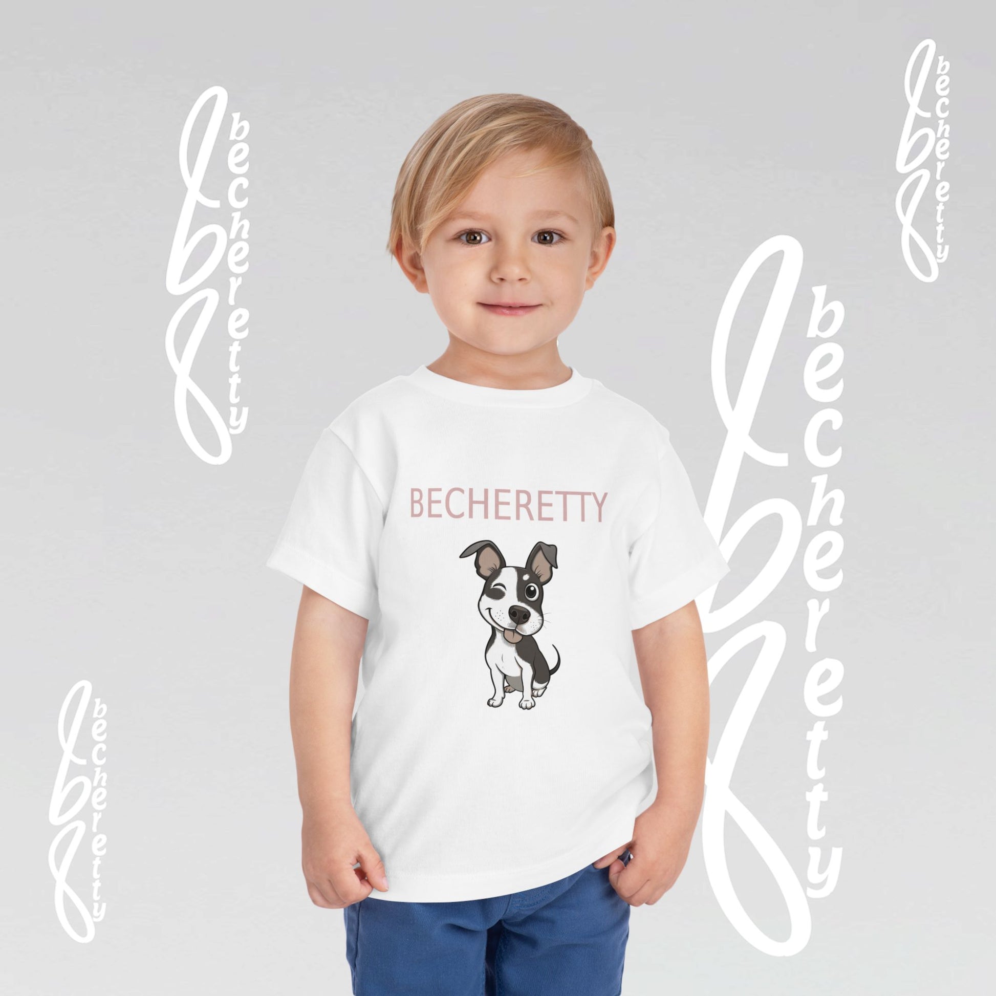 Child wearing a white t-shirt with a cartoon French Bulldog illustration and 'Becheretty name.