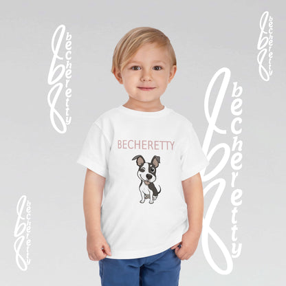 Child wearing a white t-shirt with a cartoon French Bulldog illustration and 'Becheretty name.