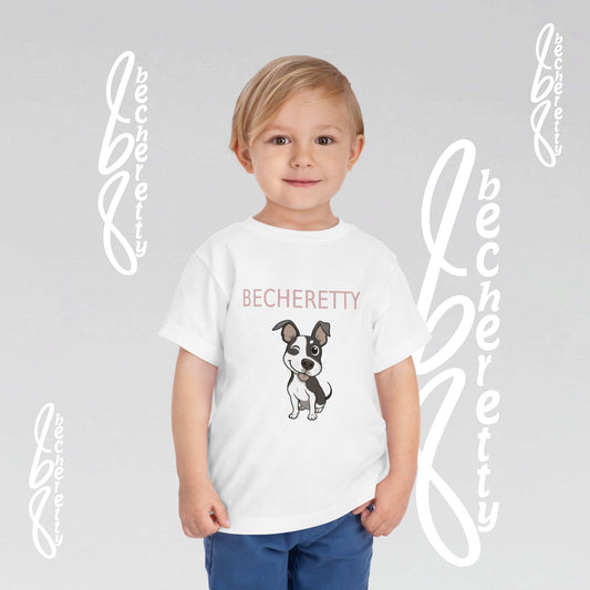 Child wearing a white t-shirt with a cartoon French Bulldog illustration and 'Becheretty name.