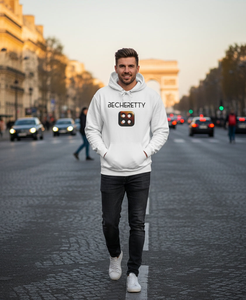 Man wearing a white hoodie with a 4 hole dice, and Art lettering, walking on a city street.