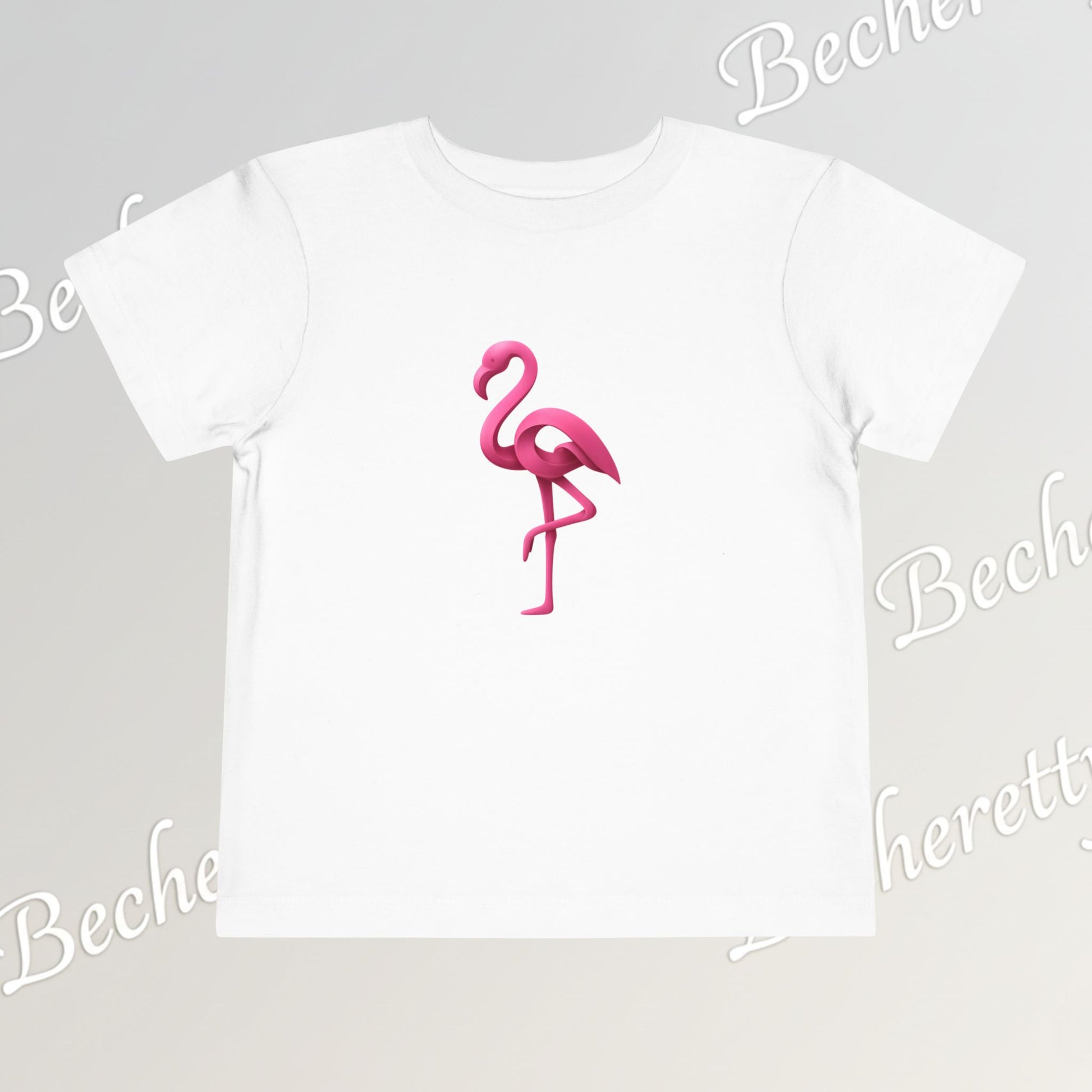 White t-shirt with a pink flamingo design on a light gray background