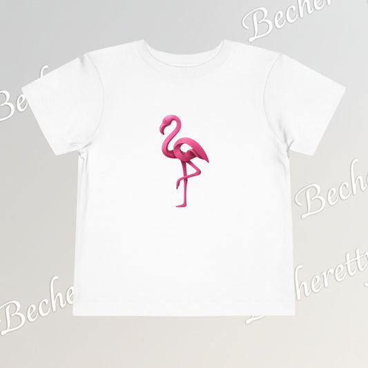White t-shirt with a pink flamingo design on a light gray background