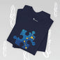 Navy t-shirt with a blue abstract puzzle piece in the middle.