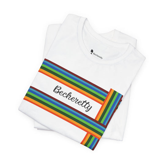White t-shirt with a minimalist graphic of a broken multi-colored fence, and the name Becheretty between two bars.