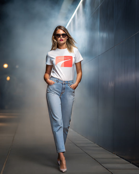 A woman walking with a white t-shirt, and a red graphic Becheretty.
