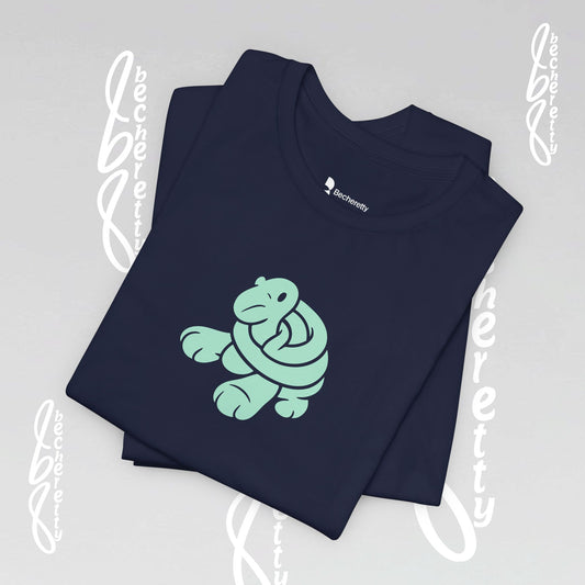 Navy blue t-shirt with a green turtle design inspired of a 10-year-old's plasticine-sculpture.