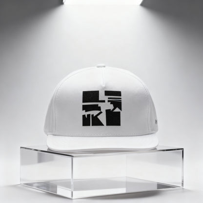 White cap with black art graphic on a clear stand against a white background