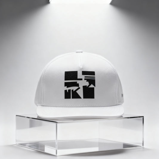 White cap with black art graphic on a clear stand against a white background
