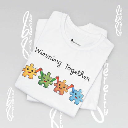 White t-shirt with colorful puzzle piece design and 'Winning Together' text on a gray background.